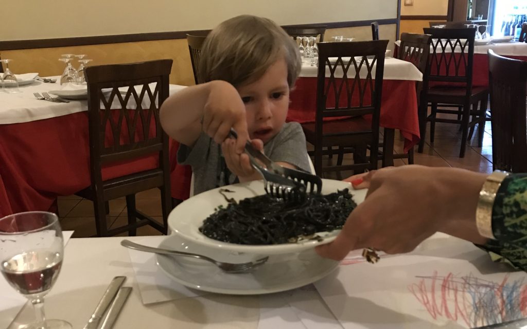 Spaghetti with cuttlefish in own ink at restaurant Scala in Portopalo