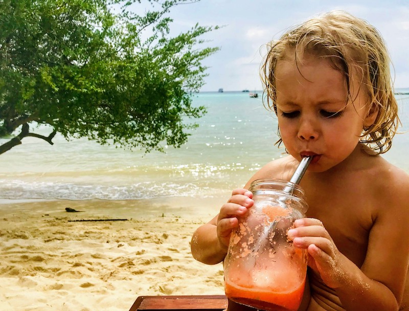 Smoothie drinking on beach Ko Tao