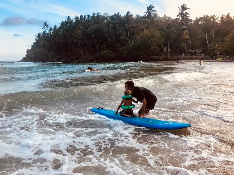 Kid on a surfboard Hirketiya